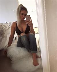 Anna Nyström in a bikini taking a selfie