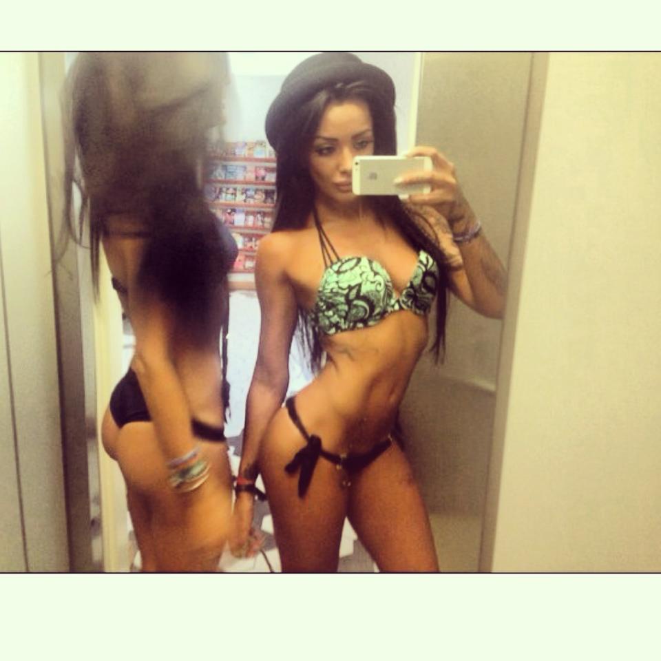 Mercedes Edison in a bikini taking a selfie