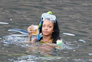 Rihanna enjoying a break on a yacht in Ponza August 29, 2014