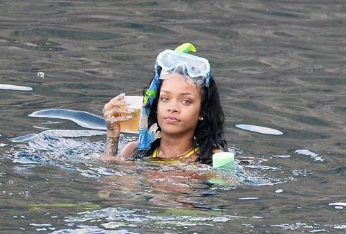 Rihanna enjoying a break on a yacht in Ponza August 29, 2014