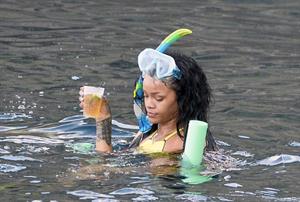 Rihanna enjoying a break on a yacht in Ponza August 29, 2014