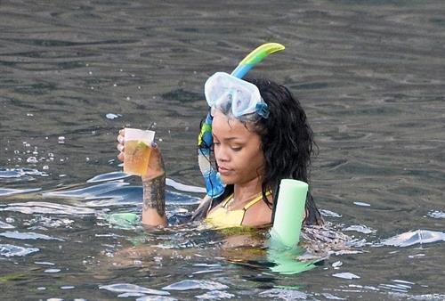 Rihanna enjoying a break on a yacht in Ponza August 29, 2014