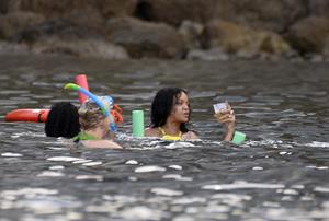 Rihanna enjoying a break on a yacht in Ponza August 29, 2014