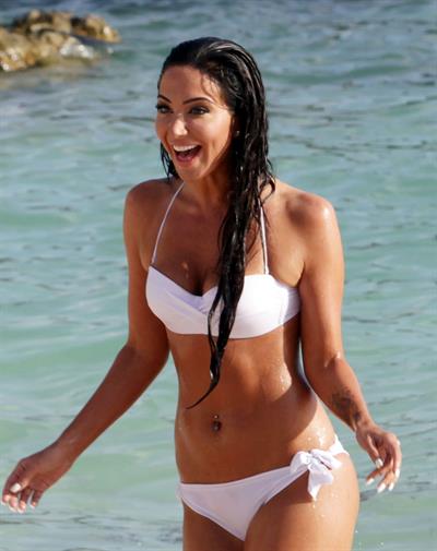 Tulisa Contostavlos in a bikini on the beach in Bermuda August 21, 2014