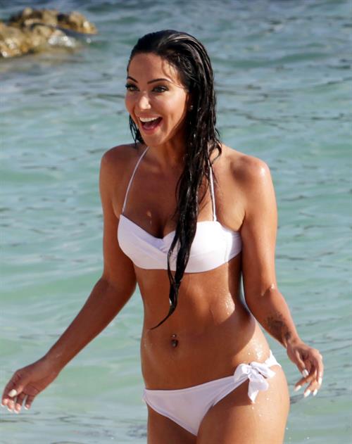 Tulisa Contostavlos in a bikini on the beach in Bermuda August 21, 2014