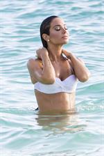 Tulisa Contostavlos in a bikini on the beach in Bermuda August 21, 2014