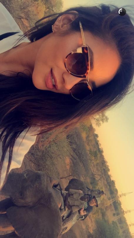 Shay Mitchell taking a selfie