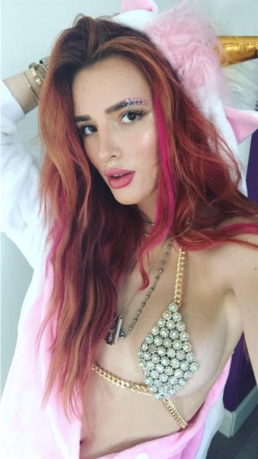 Bella Thorne in a bikini taking a selfie