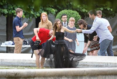 Natalie Portman modeling for a Miss Dior campaign photo shoot in the gardens of the Palais Royal in Paris 6/26/12 