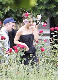 Natalie Portman modeling for a Miss Dior campaign photo shoot in the gardens of the Palais Royal in Paris 6/26/12 