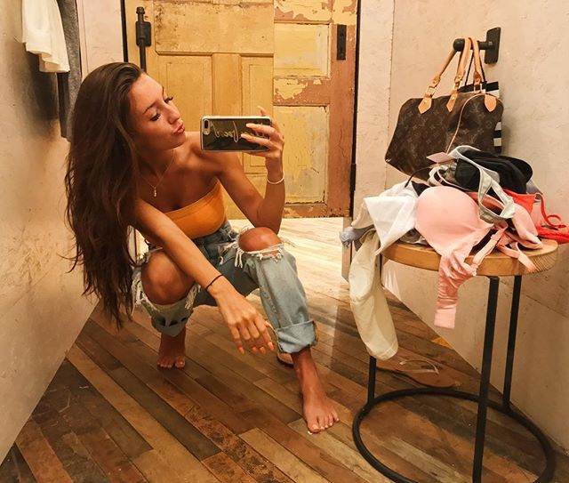 Taylor Alesia taking a selfie