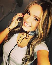 Dorota Rabczewska taking a selfie