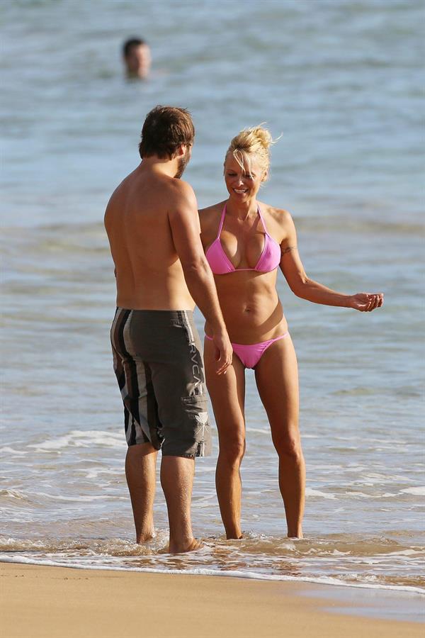 Pamela Anderson Wearing bikini on the beach in Hawaii - August 8, 2013 