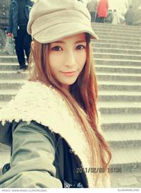 He Jing taking a selfie