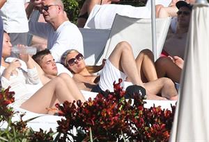 Paris Hilton poolside at their Miami hotel December 7-2012 