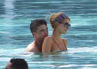 Paris Hilton poolside at their Miami hotel December 7-2012 