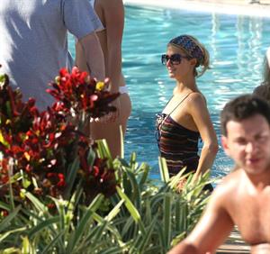 Paris Hilton poolside at their Miami hotel December 7-2012 