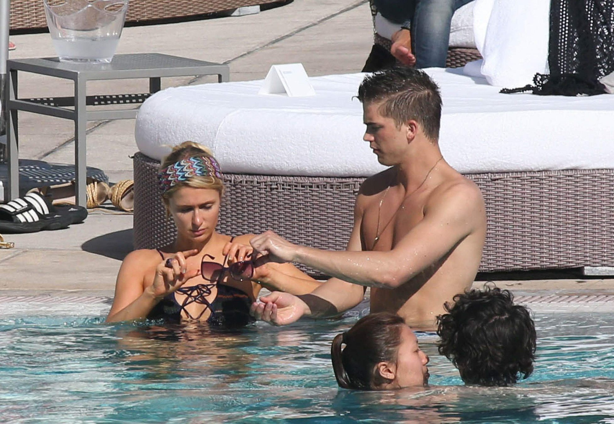 Paris Hilton poolside at their Miami hotel December 7-2012 