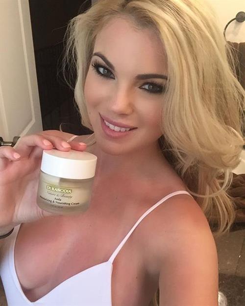 Abby Parece in a bikini taking a selfie