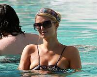 Paris Hilton poolside at their Miami hotel December 7-2012 