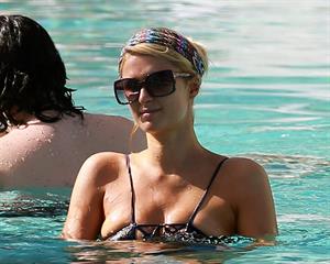Paris Hilton poolside at their Miami hotel December 7-2012 