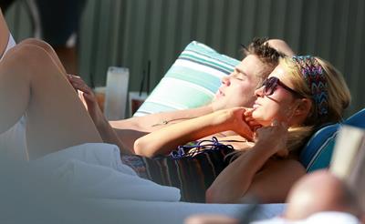 Paris Hilton poolside at their Miami hotel December 7-2012 