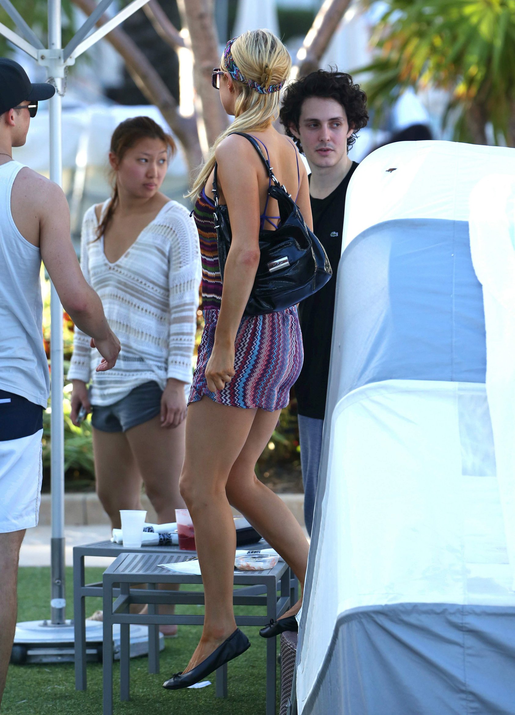 Paris Hilton poolside at their Miami hotel December 7-2012 
