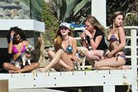 Bella Thorne in a bikini in Malibu on August 18, 2014