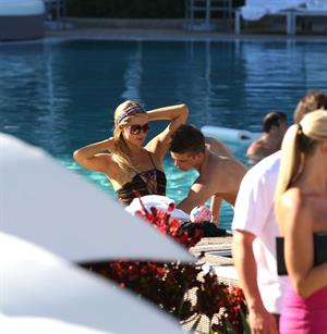 Paris Hilton poolside at their Miami hotel December 7-2012 