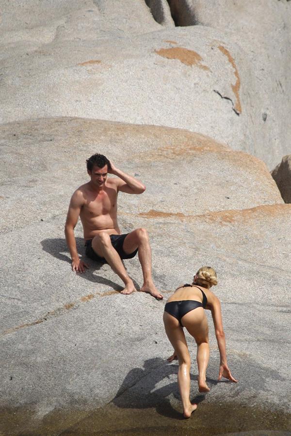 Paris Hilton - Wearing a swimsuit at a beach in France August 6, 2012