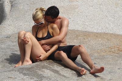 Paris Hilton - Wearing a swimsuit at a beach in France August 6, 2012