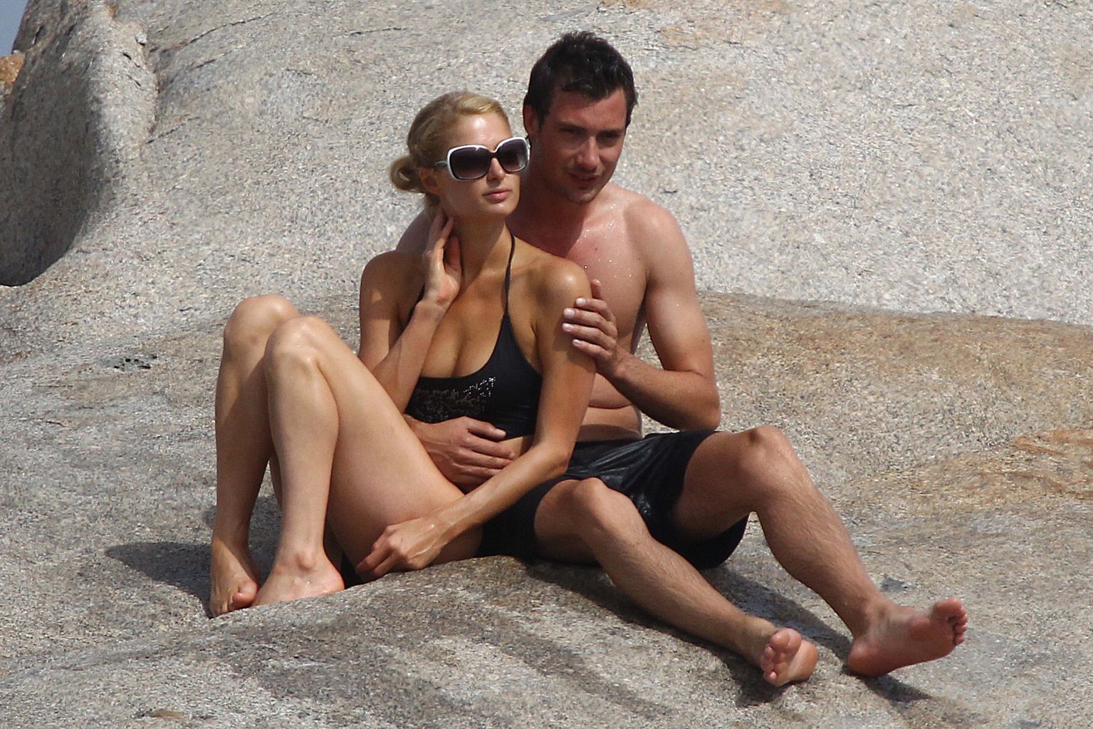 Paris Hilton - Wearing a swimsuit at a beach in France August 6, 2012