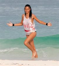 Adriana Lima – beach shoot candids in Cancun 12/2/13 