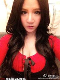 Lin Cai Ti taking a selfie