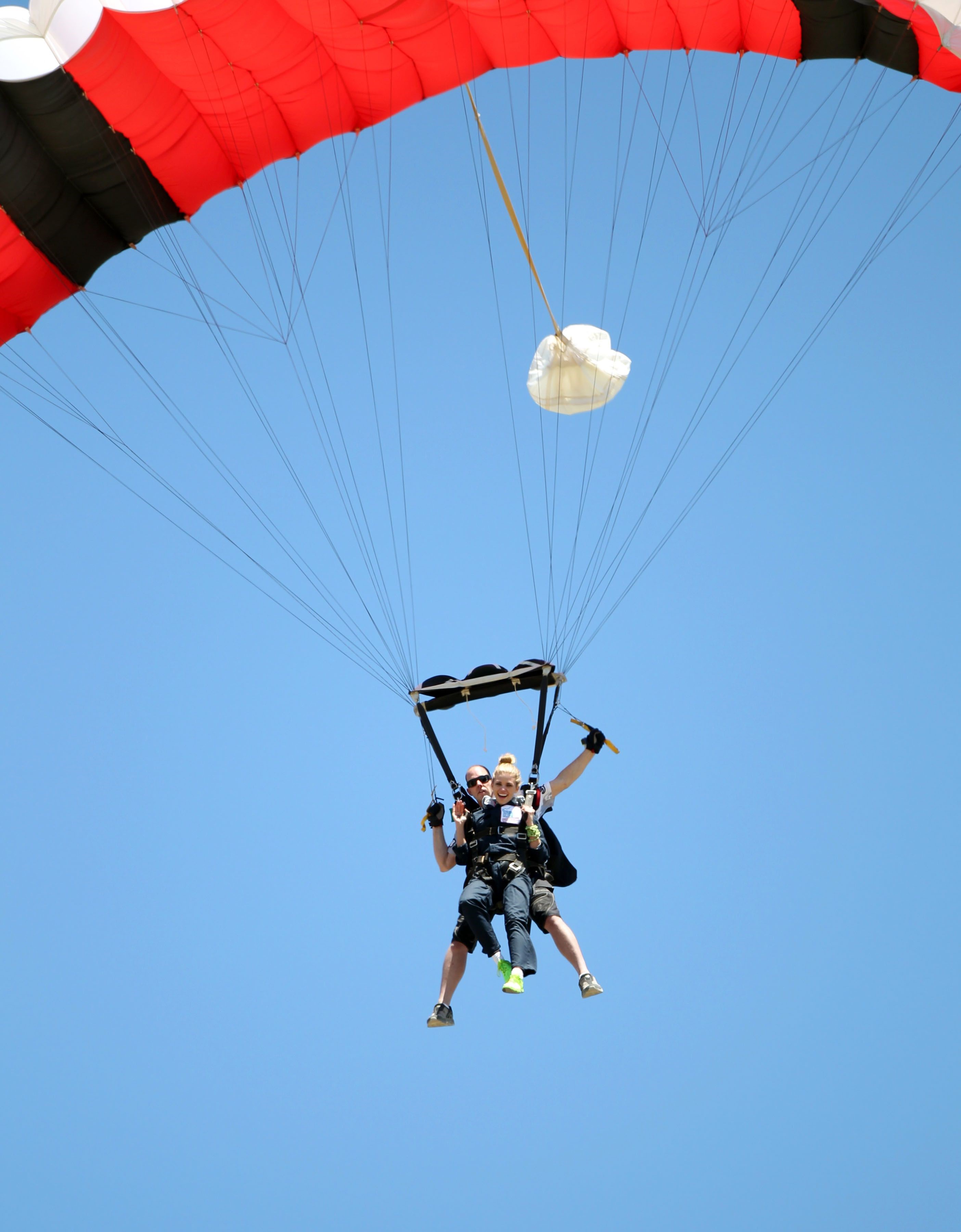 AnnaLynne McCord skydives from 18,000 feet at a charity event, Lompoc August 16, 2014