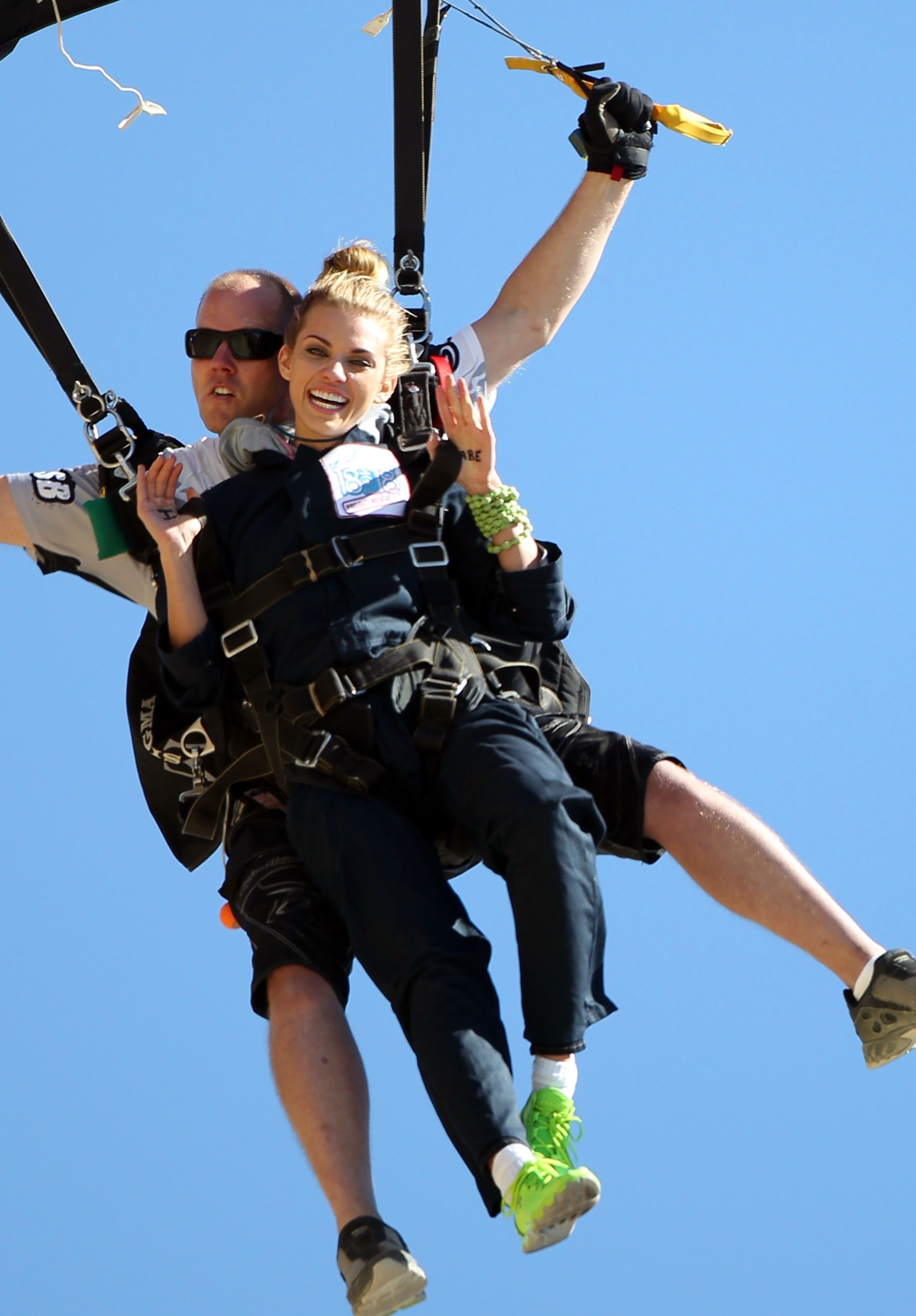 AnnaLynne McCord skydives from 18,000 feet at a charity event, Lompoc August 16, 2014
