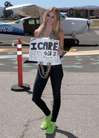 AnnaLynne McCord skydives from 18,000 feet at a charity event, Lompoc August 16, 2014