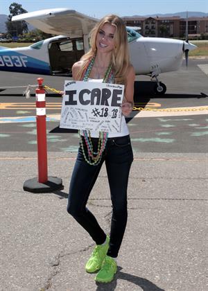 AnnaLynne McCord skydives from 18,000 feet at a charity event, Lompoc August 16, 2014