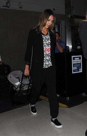 Jessica Alba arriving at LAX August 05, 2014