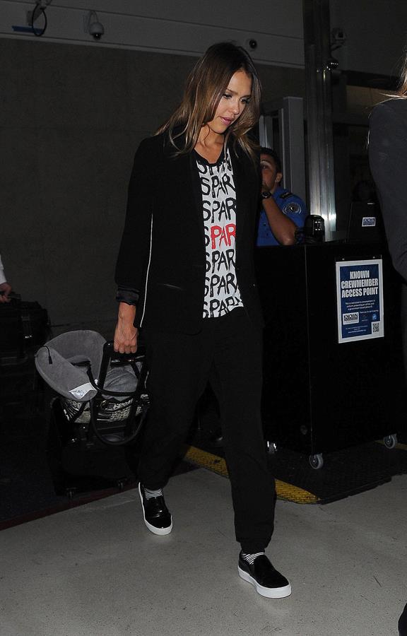 Jessica Alba arriving at LAX August 05, 2014