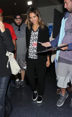 Jessica Alba arriving at LAX August 05, 2014