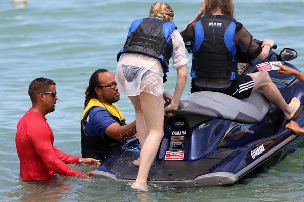 Chloe Grace Moretz candids in a Black Bikini in Miami Beach