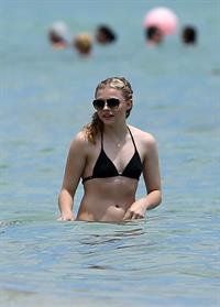 Chloe Grace Moretz candids in a Black Bikini in Miami Beach
