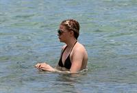 Chloe Grace Moretz candids in a Black Bikini in Miami Beach