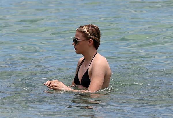 Chloe Grace Moretz candids in a Black Bikini in Miami Beach