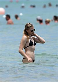 Chloe Grace Moretz candids in a Black Bikini in Miami Beach