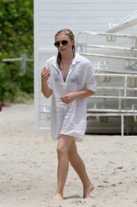 Chloe Grace Moretz candids in a Black Bikini in Miami Beach