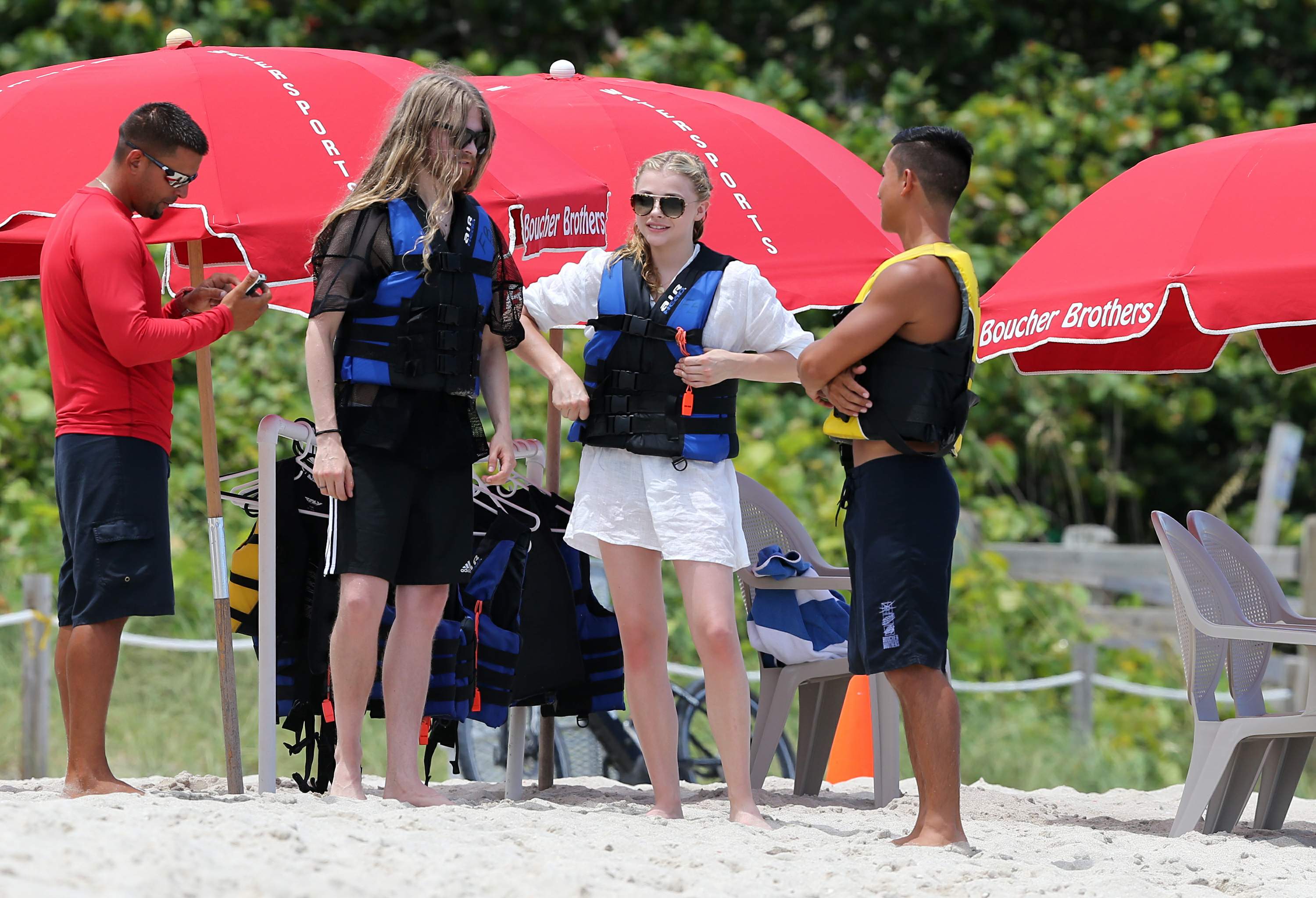 Chloe Grace Moretz candids in a Black Bikini in Miami Beach