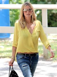 Heidi Klum out for lunch in Brentwood in a yellow shirt