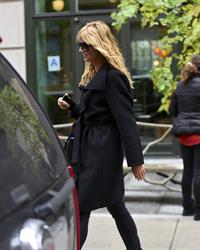 Heidi Klum leaves her hotel in New York City on November 1, 2013